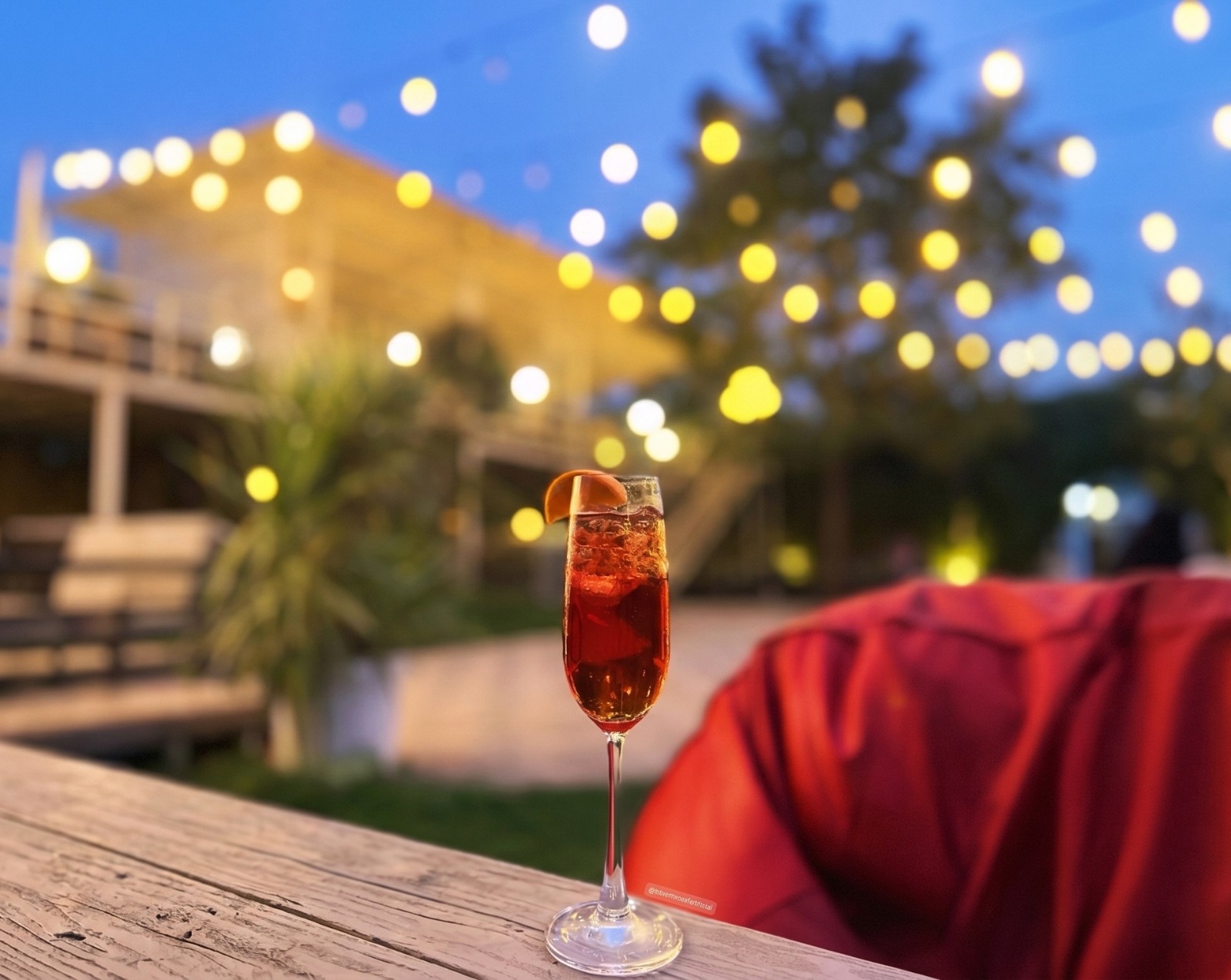 Amber Sparkler / Bombers (the cranberry Red Bull shot). Alt: Cranberry Red Bull at golden hour — Amber Sparkler shoot by P2V Labs.